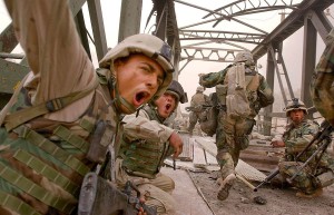Marines-advance-under-fire-into-Baghdad-during-the-early-days-of-OIF.-